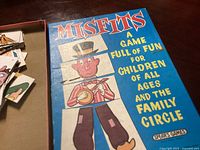 Box cover of the Misfits game with colorful cartoon character and title shown.