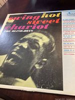 Front cover of Swing Hot Sweet Chariot vinyl record by The Blind Boys showing artwork and title.