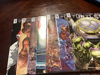 Photo showing the seven Teenage Mutant Ninja Turtles comics lined up side by side, covering issues 8 to 14.