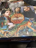 Photo of Wu Wei Journey of the Changing Path game box with illustrated characters and animals on the cover.