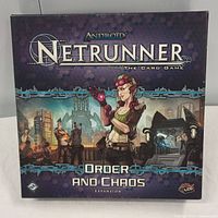Front box cover showing Android Netrunner The Card Game Order and Chaos expansion art.