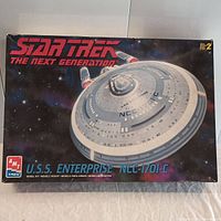 Box front showing U.S.S. Enterprise NCC-1701-C model kit and branding.