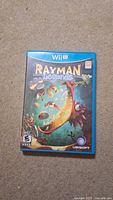 Front cover of Rayman Legends WiiU game case showing artwork and branding.