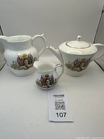 Full view of the three-piece porcelain commemorative tea set: teapot, creamer, and milk jug, all featuring King Edward VIII portrait and gold trim.