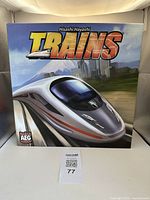 Front of Trains board game box showing train artwork and title