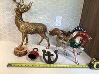 Shot of the assorted decorative items on a counter with measurement tape