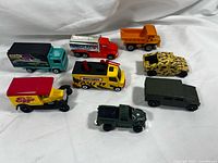 All eight die-cast vehicles grouped on surface