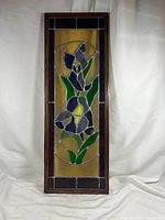 Full view of framed stained glass panel