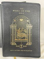 Front cover of Acts, Letters & Revelation volume showing black leatherette and gold design