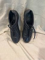 Front view of pair of Ecco navy leather Oxford style shoes showing laces and toebox