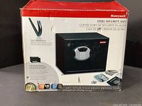 Photo of Honeywell branded box of the steel security safe showing front of package with safe picture and features.