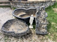 All three pond liners, statue, and waterfall panel positioned against stone wall