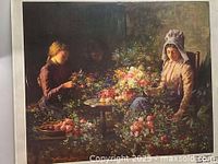 Oil painting showing three women flower sellers seated around a table with many flowers, warm natural setting.