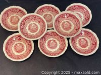 Eight Mason's Vista pink fruit bowls arranged on a surface, showing the front pattern on all bowls.
