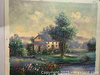 Full view of oil on canvas painting showing a house, large tree, flowering bushes, and distant hills under a cloudy sky.