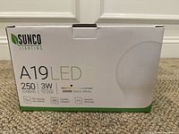 Front view of the box showing brand Sunco Lighting, product type A19 LED bulb, 250 lumens, 3 watt consumption, 3000K warm white color, smooth dimming and lifespan of 25,000 hours