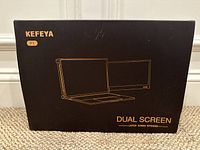 Box front of Kefeya P1 dual screen external display showing branding and graphic illustration of product.