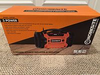 Box front side showing product image, model number CAP328, and features including 3 power sources (120V AC, 12V DC, 20V battery), LED light, nozzle & adapter included.