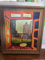Framed colorful painting showing view from a window with chair, signed by Jill Stasium.