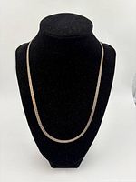 Italian sterling silver chain necklace displayed on a black necklace bust showing length and shine.