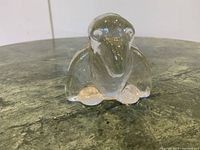 Front view of clear glass flat-back animal figurine