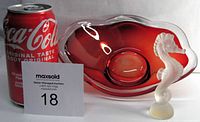 Side-by-side photo of the cranberry glass bowl and the lead crystal seahorse figurine shown next to a Coke can for scale