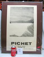 Framed Roland Pichet poster with brown mat and glass, Coke can for scale, showing full poster including abstract black and white design and text.
