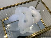 Top view showing quartz snake inside glass and brass box