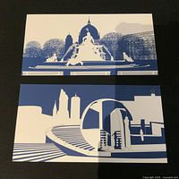 Two blue-white architectural prints displayed