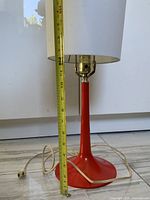 Full lamp with tape measure indicating height