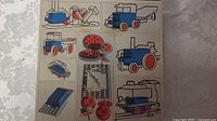 Photo of the back side of the box showing assembly illustrations for the motor and wheels in the vintage LEGO System set.