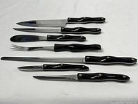 Overview of all seven Cutco knives and utensils on white background