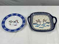 Photo of both snowman-themed ceramic platter and plate together showing design and size comparison.