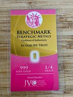 Front view of the Benchmark Strategic Metals certificate of authenticity packaging, showing gold bar, .999 fine gold purity and 1/4 grain weight