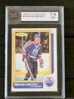 Front of 1986-87 Wayne Gretzky O-Pee-Chee #3 hockey card in graded slab showing player image, logos, and grade label.