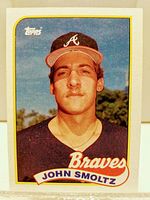 Front image of the 1989 Topps John Smoltz rookie baseball card showing player portrait and card details