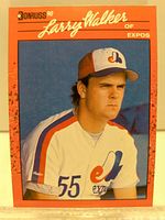 Front side of Larry Walker 1990 Donruss baseball card showing player portrait and team details.