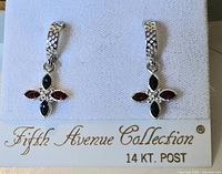 Front view of the pair of Fifth Avenue Collection earrings displayed on a card showing the brand name and 14K gold post label.