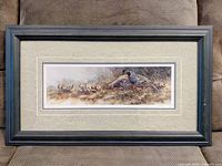 Full view of the framed print showing a quail and chicks in natural landscape with a blue-gray rustic wood frame and beige/olive matting.