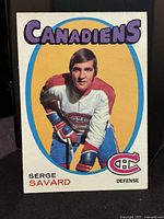 Front of the 1971-72 O-Pee-Chee Serge Savard hockey card with bright color and player image.