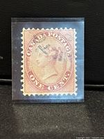 Close-up photo of one used 1 cent Canada Post stamp featuring Queen Victoria in profile with cancellation mark, perforated edges visible.