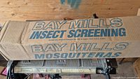 Cardboard box labeled Bay Mills Insect Screening Mosquiteras