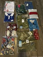 Full view of all 11 items laid out on floor, showing packaging and variety of sportswear styles.