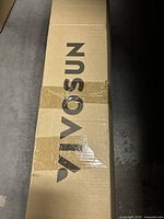 Closed cardboard box with VIVOSUN branding on top, presumably the packaging for the grow tent.