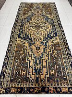 Full view of the Hamadan rug showing the entire design and overall condition.