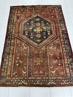 Full view of rectangular Hamadan rug showing overall design and colors