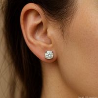 Diamond stud earring worn on ear to show size