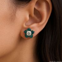 Earring worn on model’s ear to show scale and appearance