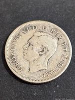 Obverse side showing King George VI portrait and inscriptions.