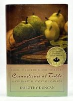 Front cover of the hardcover book showing the dust jacket with pears and cinnamon sticks image and Canadian Culinary Book Award sticker.